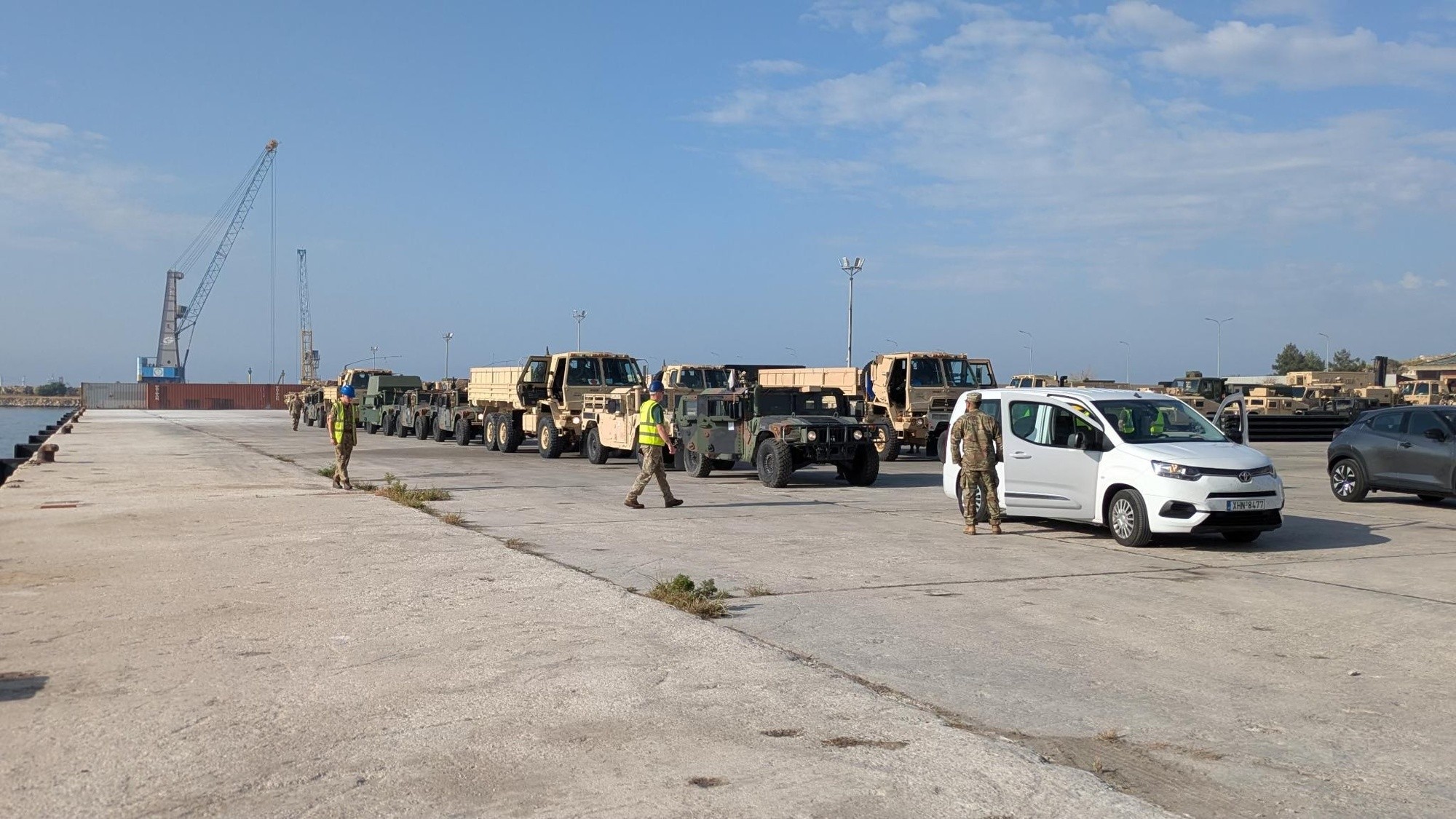 image a line of vehicles in Mediterranean environment
