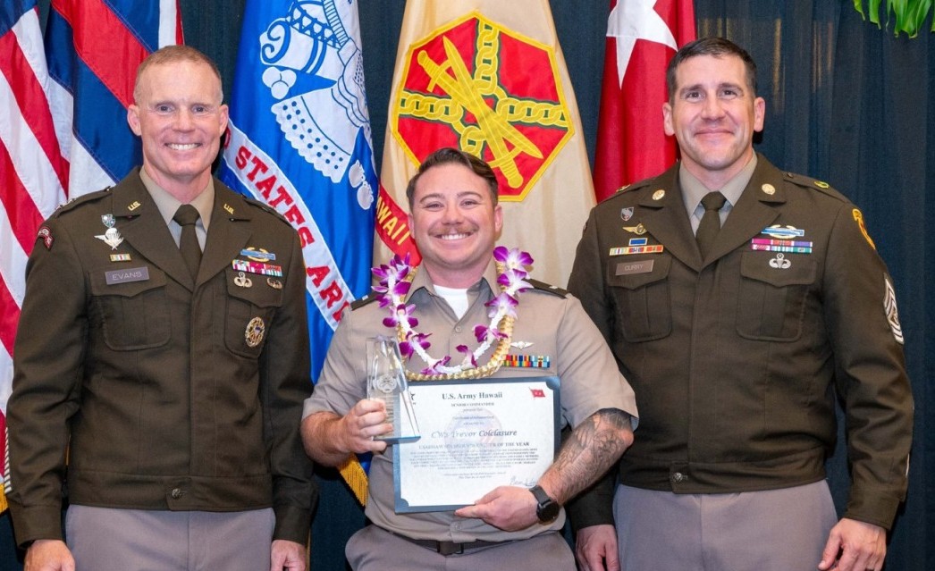 image of a volunteer being awarded