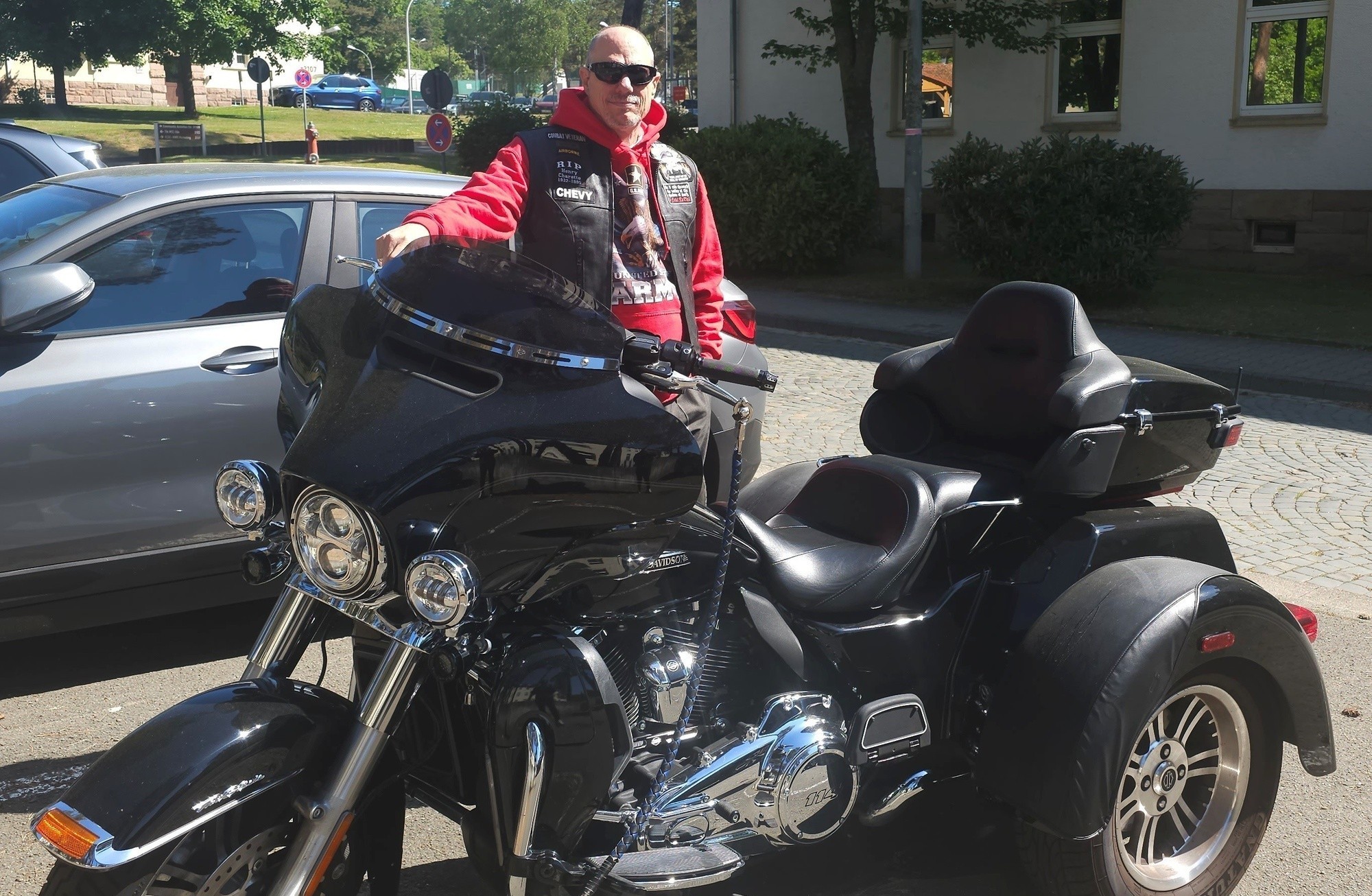 image of man in a unique motorcycle
