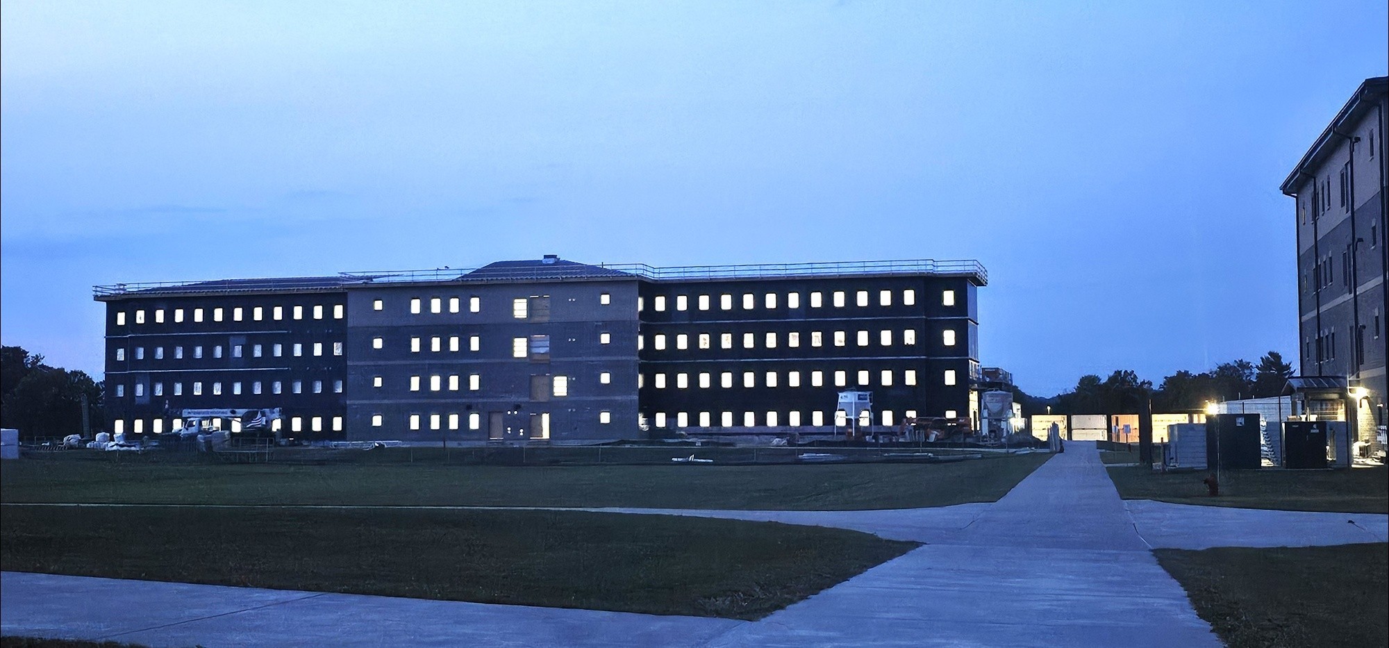 An image of a military barracks building on a cloudy day